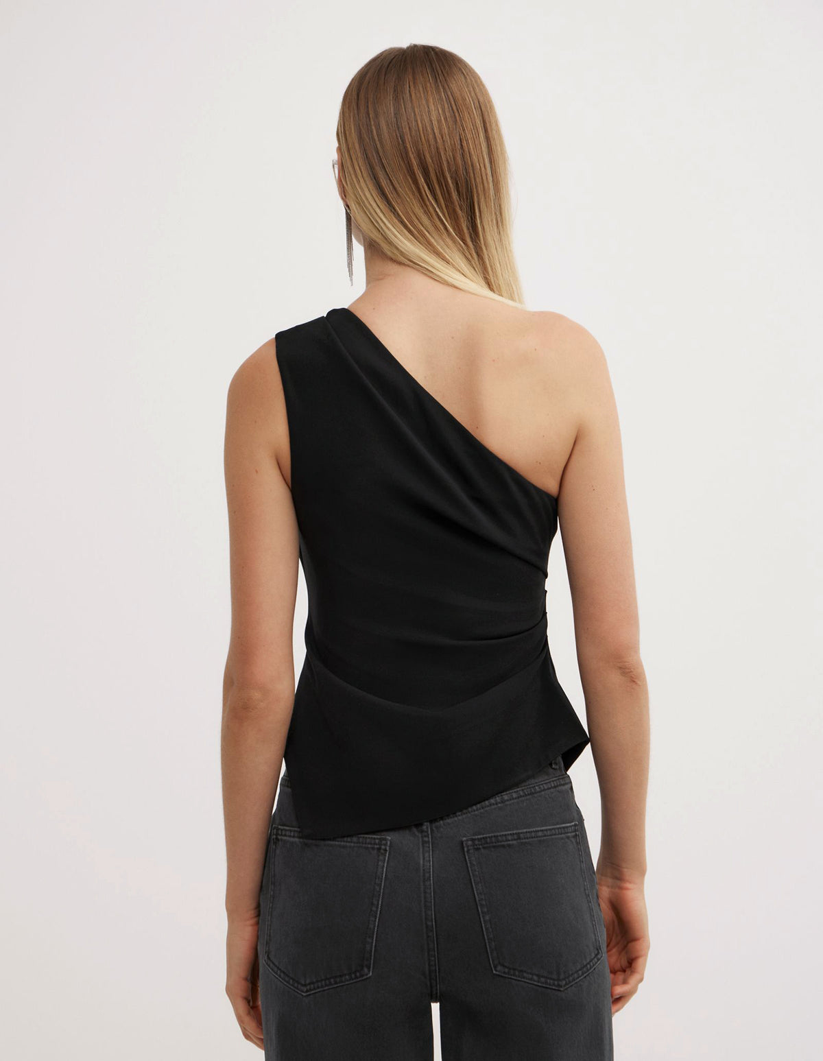 Asymmetric Structured Top